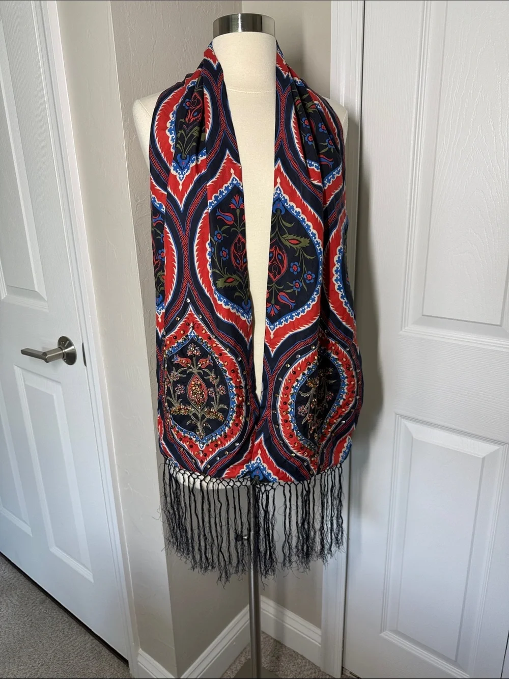 Navy bkue and red print scarf with fringe, beading, and jewel embellishments